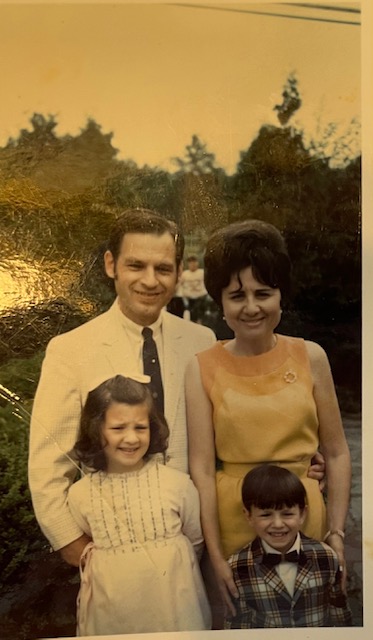 A family photo of Helen and Harry with their children, Rita and Mark